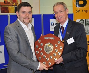 B&ES president Bruce Bisset presenting Jamie Peffers of B&ES member C&M Environmental, Glasgow, with the Scottish RAC Apprentice of the Year Award